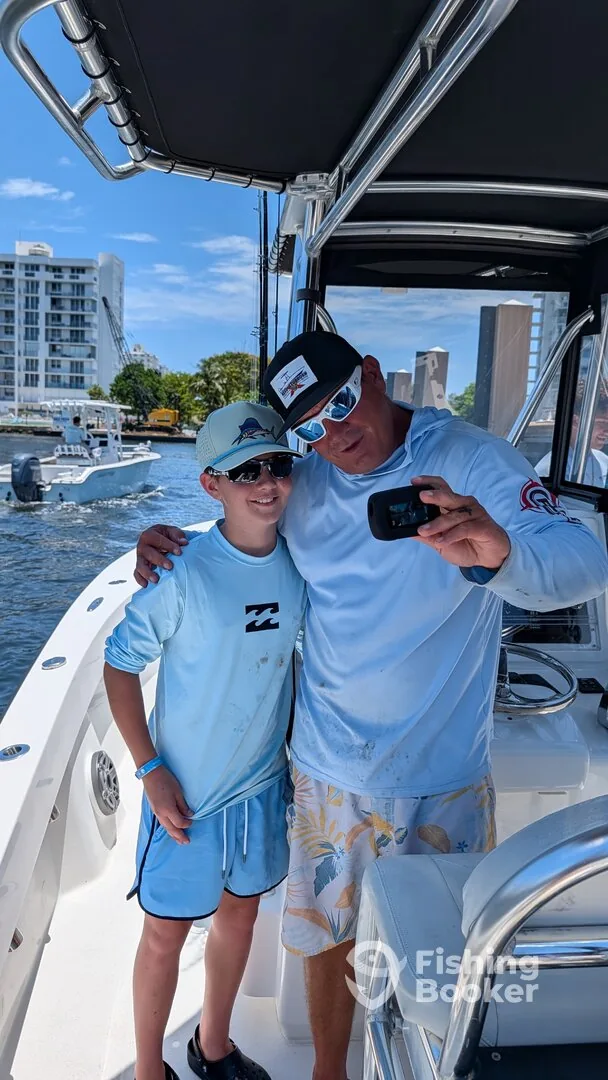 Captain Lacy and guests on the water during a Pompano Beach charter